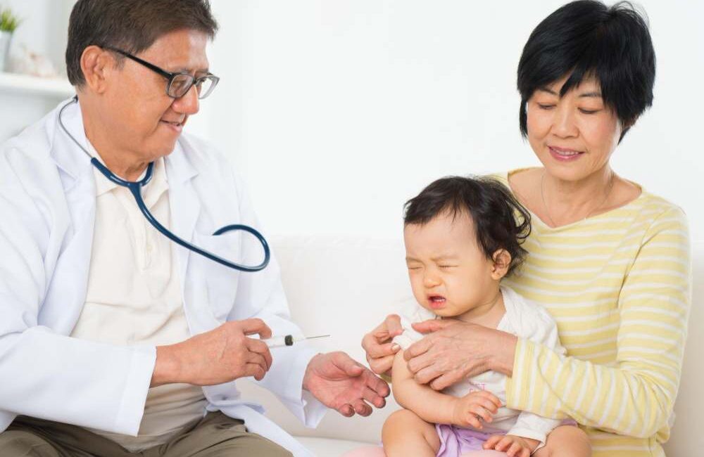 Paediatrics checking a baby